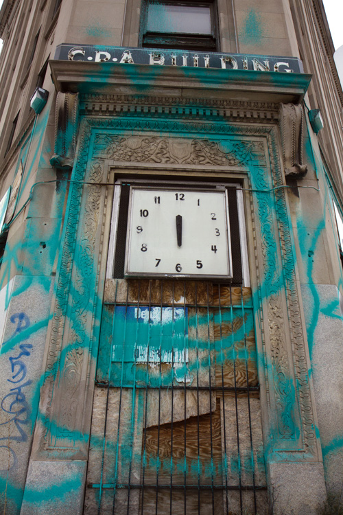 Art, vandalism or civil disobedience? “Fire extinguisher graffiti” splashed on Detroit buildings