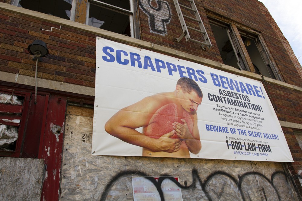 A banner posted on a vacant building on w. Grand River. Photos by Steve Neavling