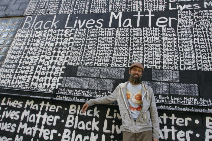 Muralist meticulously writes ‘Black Lives Matter’ on Detroit gallery wall