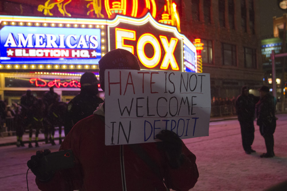 A protester at the GOP debate in Detroit earlier this year. 