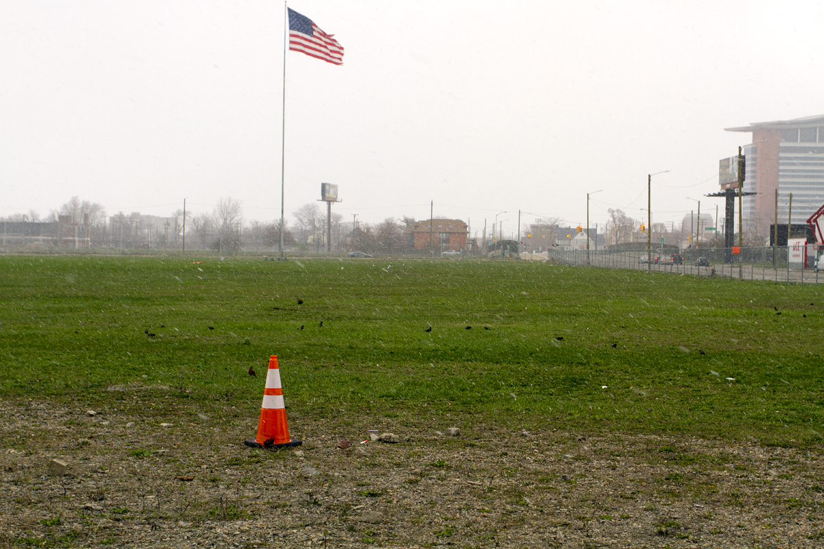The orange cone marks the spot where the body was found on the old Tiger Stadium field. Photos by Steve Neavling. 
