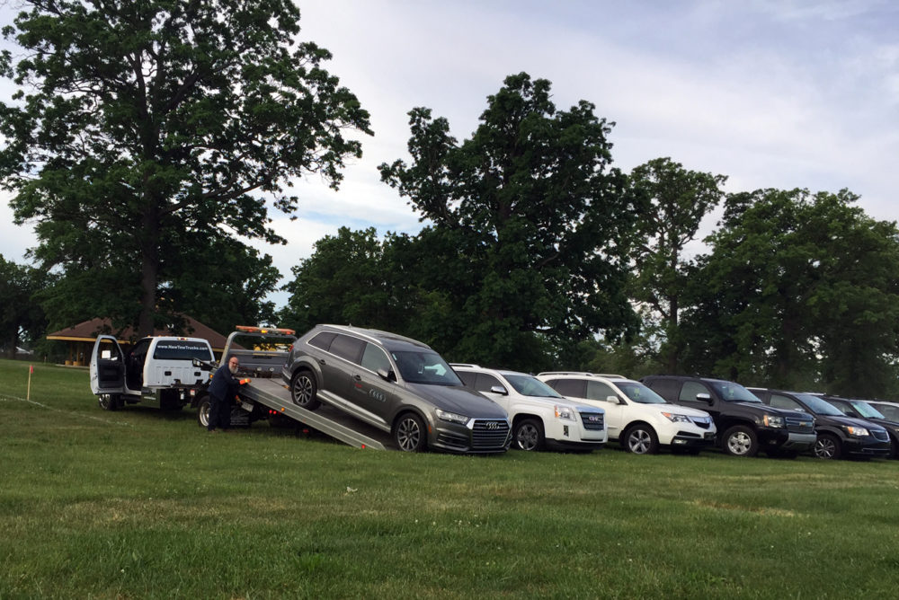 Cars being parked on Belle Isle. Photo by Michael Betzold. 