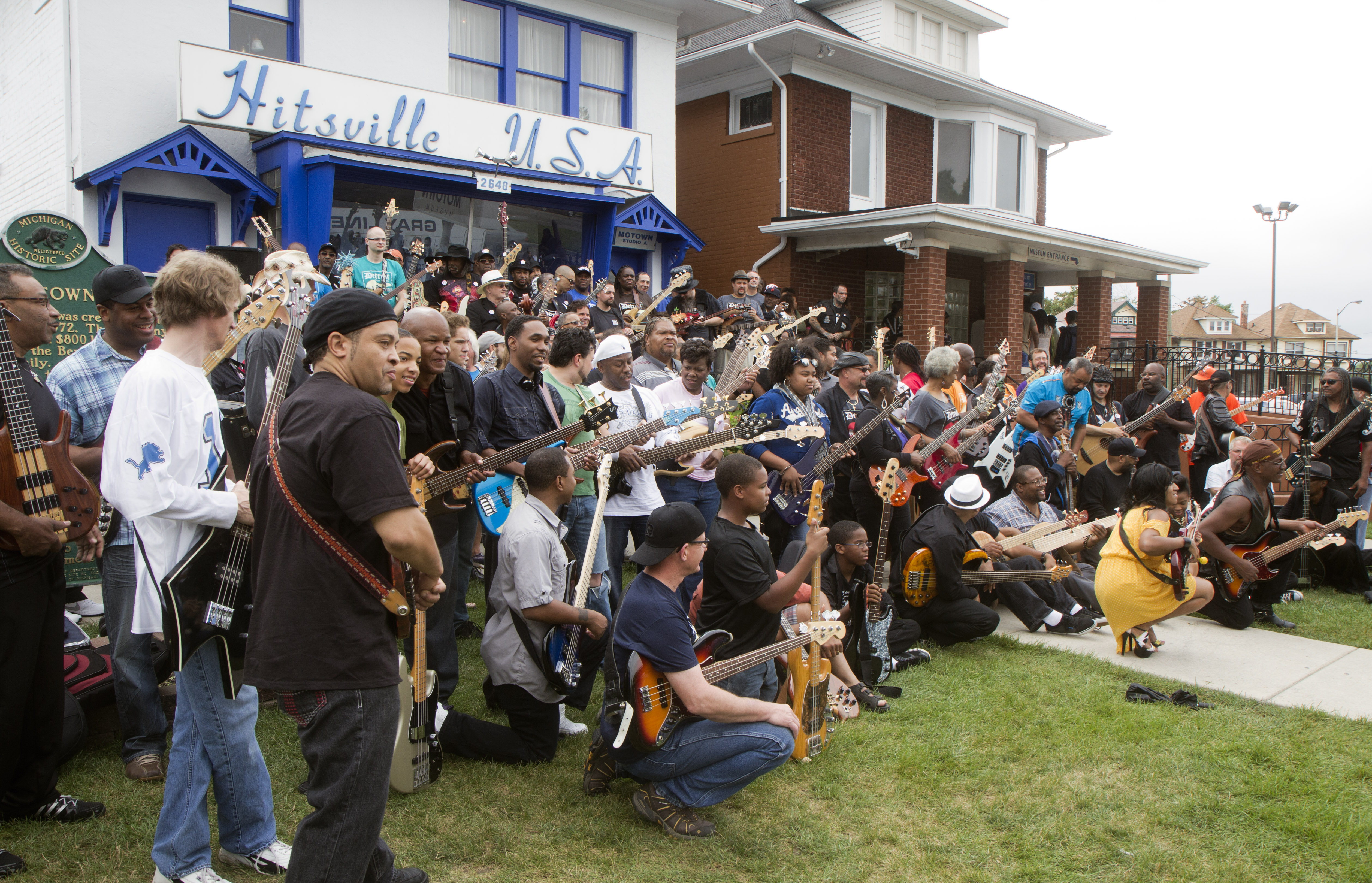 Bassists gather in front of the historic Hitsville USA building