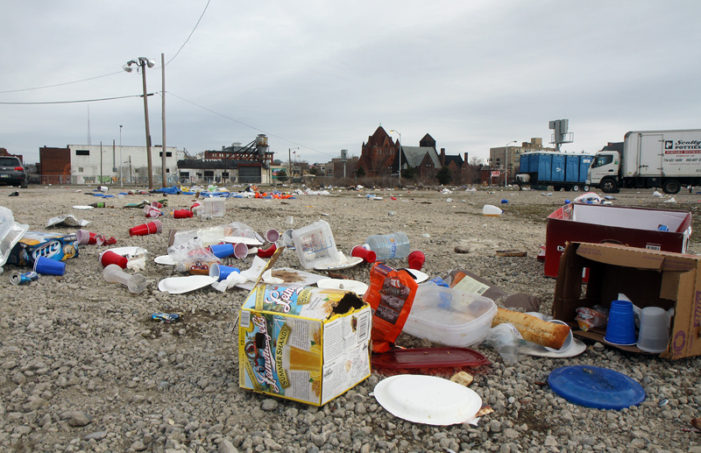 Aftermath of Tigers Opening Day: Red cups, blood, rotting food, vomit, broken windows & beer bottles