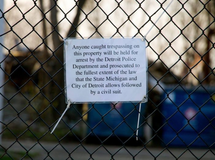 Busted! Chicago-area investor forced to stop scavenging vacant building in Detroit