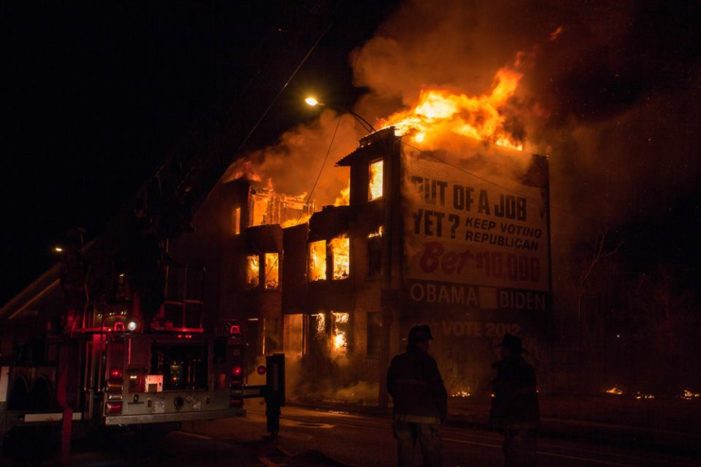 Fire guts apartment building known for enormous Obama ad off I-75 in Detroit