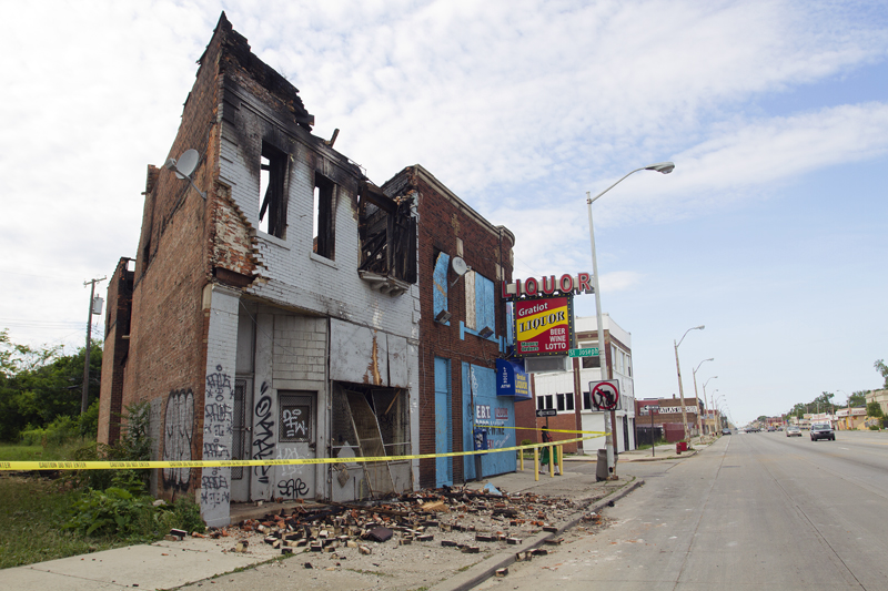 Suspicious fire gutted this vacant commercial building on Gratiot near Mack. Photos by Steve Neavling. 