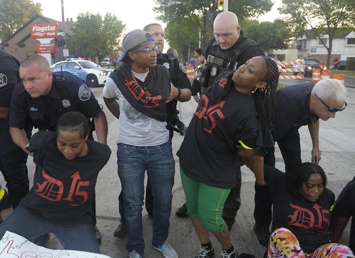 Dozens of fast-food workers arrested at protest in Detroit, Grosse Pointe
