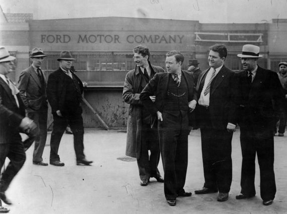 Walter Reuther, center, right, and supporters were attacked by Ford security men in 1937.