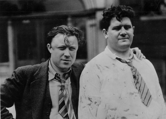 Bloodied Walter Reuther, left, and Richard Frankensteen after a scuffle with Ford security men during the Battle of the Overpass. 