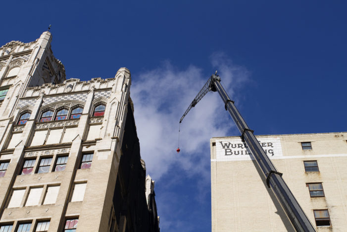 Chunks of Wurlitzer crash down on People Mover tracks in downtown Detroit