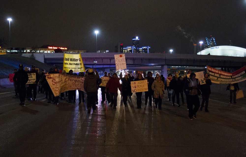 Protesters march north on I-75 in Detroit. Photo by Steve Neavling
