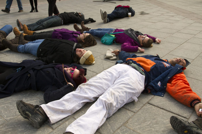 Photos: ‘Die-in’ rally in downtown Detroit gives way to civil disobedience
