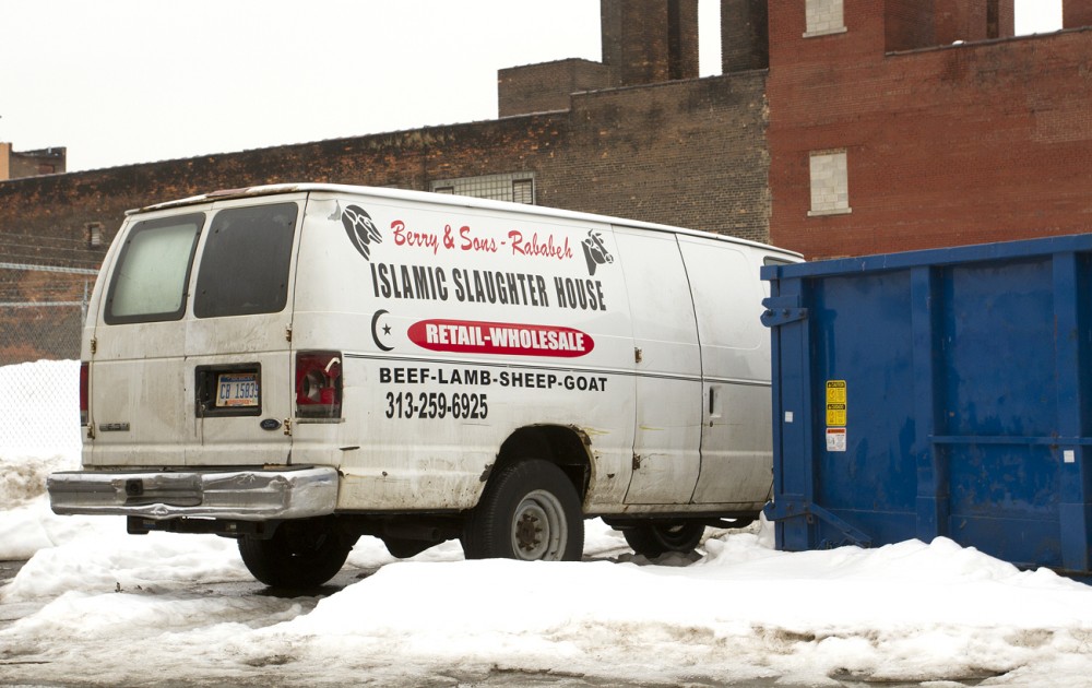 Berry and Sons Islamic Slaughter House van beside the carcass-filled dumpster in Eastern Market. Steve Neavling/MCM 