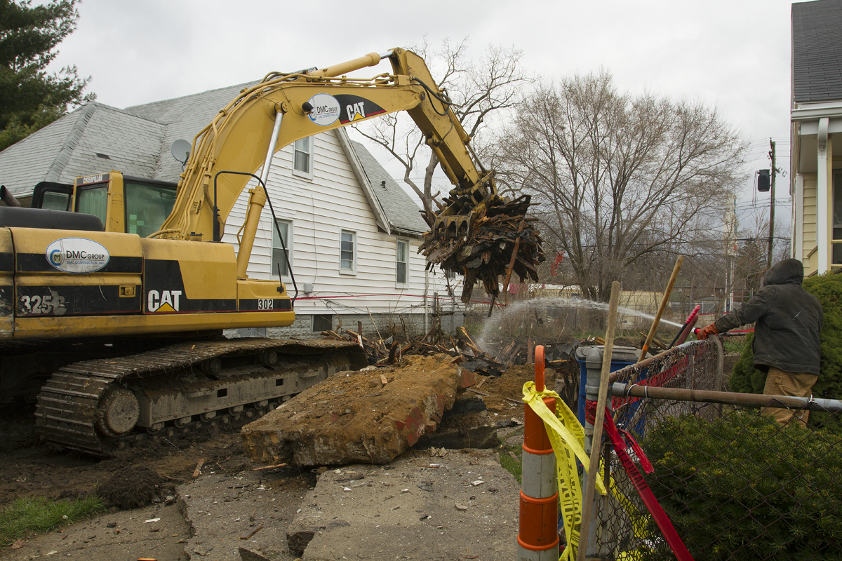 An emergency crew demolished the remains of the "art" house at 20195 Stoepel. 