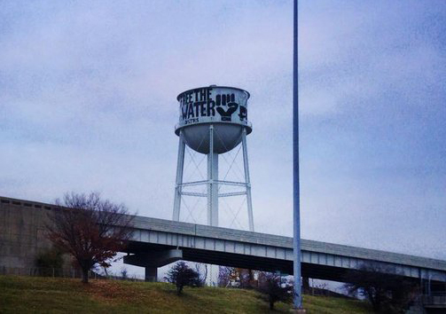 "Free the Water" and black fist mural on a water tower in Highland Park. Photo courtesy of Detroit Water Brigade. 