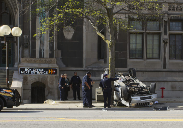SUV full of high school students flips over, nearly strikes Masonic Temple in Detroit