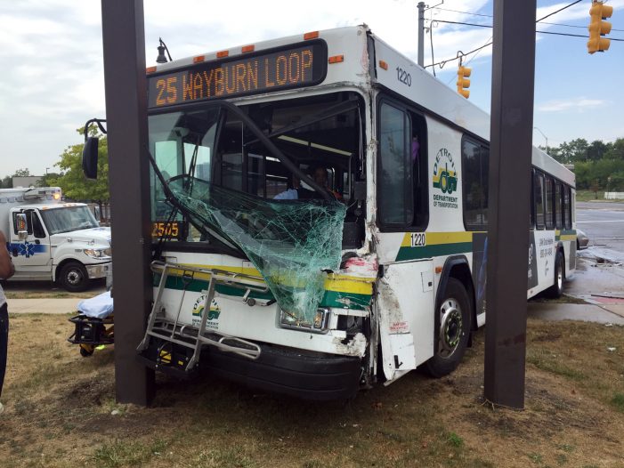 DDOT bus driver injured after striking a garbage truck and billboard