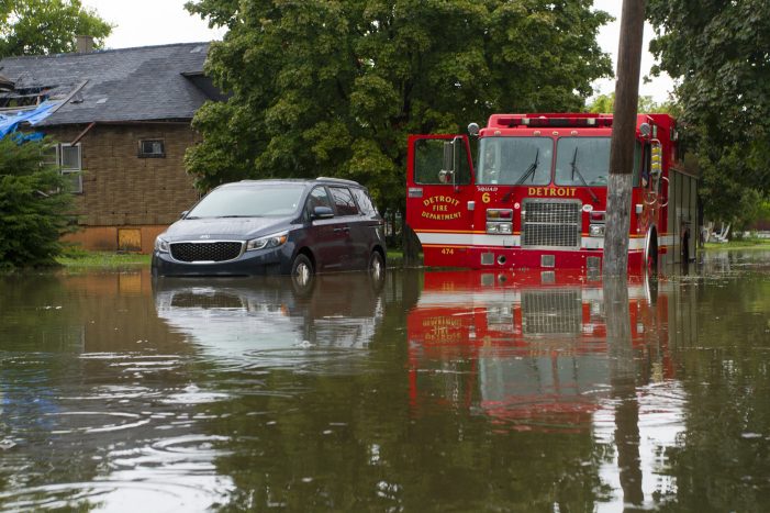 17 photos: Torrential rain stranded motorists, turned streets into rivers